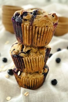 Three moist blueberry banana oatmeal muffins stacked on top of each other with blueberries and oats scattered about. Oatmeal Muffins Gluten Free, Blueberry Banana Oatmeal Muffins, Blueberry Banana Oatmeal, Oat Flour Muffins, Blueberry Banana Muffins, Oat Flour Recipes, Muffins Gluten Free, Blueberry Oatmeal Muffins