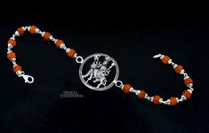 This amazing silver Rakhi crafted from 925 silver with immense precision. It exudes excellent craftsmanship and will surely look wonderful on your brother's wrist. handmade custom design Goddess divine Bracelet Or Rakhi bracelet with silver, rudraksha and holy Basil Rosary beaded chain, this is special design beaded bracelet we can use either Rakhi bracelet or daily use bracelet for unisex. Best Rakshabandhan Festival best wishes sibling gift for your brother and sister's , Metal-925 sterling si Silver Bracelets For Navratri, Silver Bracelet For Navratri Festival, Silver Bracelets For Navratri Rituals, Silver Bracelet For Navratri Rituals, Spiritual Silver Bracelets For Diwali, Spiritual Bracelets For Diwali Rituals, Bracelet Jewelry As Navratri Gift, Bracelet Jewelry Gift For Navratri, Silver Bracelet For Puja And Festivals