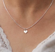 "Choose your number of dainty sterling silver hearts with initials to represent kids, loved ones or friends. TO ORDER -- Select the number of heart initials you would like and the chain length from the drop down menus. In the \"notes to seller\" box at checkout please let me know the initials you would like in the order you would like them (from left to right). The Sterling Silver hearts with initials measure 12 x 8mm or approximately just under 1/2\" by just over 1/4\". Your necklace will arriv Jewelry From Boyfriend, Couple Necklaces Boyfriends, Long Distance Relationship Jewelry, Olivia Bennett, Boyfriend Girlfriend Necklaces, Couple Initial Necklace, Engraved Heart Necklace, Initial Heart Necklace, Mother Necklace Personalized