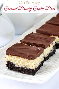 chocolate and white cake bars on a plate with the words, oh so easy coconut beauty cookie bars