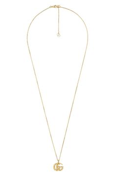 Free shipping and returns on Gucci Double-G Pendant Necklace at Nordstrom.com. A double-G pendant makes a shining statement on this versatile 18-karat gold necklace finished with tiny, delicate GG logos at the extender. Gucci Necklace Gold, Buy Earrings Online, Gucci Floral, Gems Bracelet, Buy Earrings, Gold Bracelet For Women, Flower Pendant Necklace, Long Pendant Necklace, Station Necklace