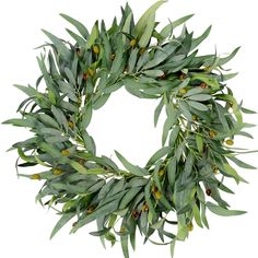 a wreath made out of green leaves and berries