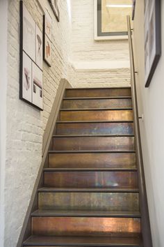 the stairs are made of wood and metal