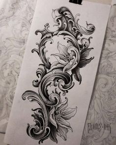 an ornate tattoo design on a piece of paper