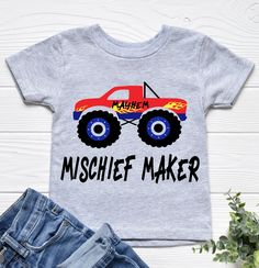 "This \"Mischief Maker\" Mayhem monster truck toddler t-shirt is perfect for any monster truck lover. Sums up the life of a little one. Buy for yourself or give as the perfect gift! Short sleeve 100% cotton shirt. Wanting a different color or saying for the shirt? Wish it was long sleeve? Send the shop a convo to create the custom order you're looking for!" Monster Truck Shirt, Truck Lover, Lover Gift Ideas, Truck Shirt, Truck Shirts, Boy Shirt, Kids Graphic Tees, Funny Sayings, Monster Truck