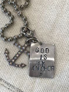 A personal favorite from my Etsy shop https://www.etsy.com/listing/577816549/god-is-my-anchor-stamped-necklace Luxury Collectible Necklace Stamped 925, Silver Hand Stamped Metal Necklace, Silver Anchor Necklace In Sterling Silver, Silver Anchor Necklace Nautical Style, Silver Necklace With Engraved Anchor Pendant, Silver Stainless Steel Anchor Necklace, Stamped Necklaces, Stamped Jewelry, Metal Necklaces