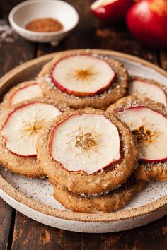 apple slices and cinnamon sugar cookies on a plate