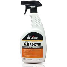 a bottle of cleaner that is on a white surface with the caption expert haze remover