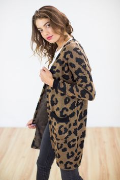 Cardigan LEO. A statement jacket on your closet that will upgrade any look of yours. Wear with a monochrome outfit and we promise it will keep you both warm and stylish. Loving the Leopard prints and side pockets of it. Long pattern to have you looking cool and cozy! For any other question please feel free to ask us! Materials Cotton 50 % Acrylic 50 % Model info bust 85 cm waist 61 cm hip 89 cm height 176 cm Model in photo wears a size S. Care Instructions Wash with similar colours. Do not tumbl Casual Leopard Print Outerwear For Layering, Leopard Print Layering Outerwear For Fall, Trendy Leopard Print Cardigan For Fall, Chic Leopard Print Cardigan For Fall, Leopard Print Cardigan For Fall Layering, Casual Long-sleeve Cardigan With Letter Print, Fall Leopard Print Cardigan For Layering, Animal Print Cardigan, Chic Fall Leopard Print Cardigan