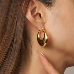 "The new titanium steel with 18K gold plated earring! These dainty, delicate pieces are perfect for daily collocation. Whether you're looking for a gift for her or you just want to add a touch of luxury to your own look, these Jewelrys are perfect for you. ✰ Elegant and classy design is a great christmas gifts and stocking stuffer ideas! ✰ Minimalist plain hoop earrings in gold which are suitable for everyday wear and great for all occasions. ✰ Earrings are suitable for daily use and gifting, al Gold Earrings Designs For Daily Use, Stocking Stuffer Ideas, Classy Earrings, African Earrings, Classy Design, Earrings Round, Unique Gifts For Women, Classy Jewelry, Gold Earrings Designs