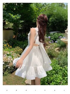 Tavimart women summer ruffle backless white party dress female A-line lace up elegant sleeveless holiday dress Sleeveless Backless Summer Wedding Dress, White Sleeveless Backless Dress For Prom, A-line Backless Dress For Spring Prom, White Sleeveless Backless Prom Dress, Backless Summer Midi Dress With Ruffles, Summer Backless Midi Dress With Ruffles, Summer A-line Midi Dress For Prom, Elegant Ruffle Dress For Summer Prom, Summer Ruffle Dress For Garden Party