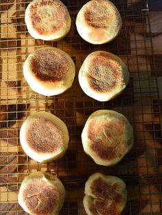 some food is sitting on a wire rack and ready to be cooked in the oven