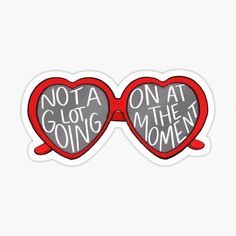 two heart shaped sunglasses with the words not a glob at the moment sticker