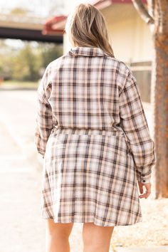 Start a new chapter in your wardrobe with this beauty! This dress has a trendy plaid design that is just in time for the season! The adorable waist tie and flirty fit is perfect for a date night or a day out on the town! We see this dress paired with some cute accessories and boots for a sassy chic look! 100% Cotton Chic Gingham Plaid Dress For Fall, Gingham Plaid Dress For Day Out In Fall, Casual Plaid Dress For Fall Day Out, Plaid Dress For Day Out In Fall, Chic Plaid Dress For Fall, Plaid Button-up Dress For Day Out, Plaid Mini Dresses With Button Closure, Fall Button-up Plaid Dress, Casual Plaid Button-up Dress