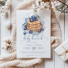 a blueberry pancake baby shower is displayed on a table