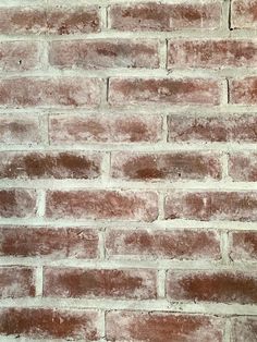 an old brick wall with no mortar or mortar