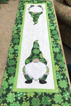 a green table runner with an image of a man on it