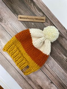 "I just love Fall, its the perfect time of year. Orange, yellow and reds all very, the cold hits and you get to put on your favorite beanies! This one is one of them. Candy Corn wool beanie. Its the perfect touch for Fall. KIDS AND BABY SIZE AVAILABLE → https://www.etsy.com/listing/1011330930/candy-corn-beanie-newborn-candy-corn-hat?ga_order=most_relevant&ga_search_type=all&ga_view_type=gallery&ga_search_query=candy+corn+beanie&ref=sc_gallery-1-1&plkey=21e9560e7f49d357c361aa9 Warm White Bonnet For Fall, White Hats For Fall, One Size, White One-size Hats For Fall, Fall Beanie Mini Hat One Size, White Acrylic Hat For Fall, Knitted Fall Bonnet, One Size Fall Cap Mini Hat, White Hats For Fall, One Size Fall Mini Cap Hat