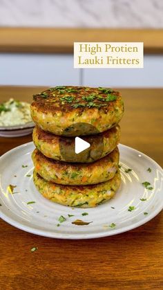 a stack of food sitting on top of a white plate