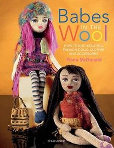 the cover of babes in the wool book, with two dolls sitting next to each other