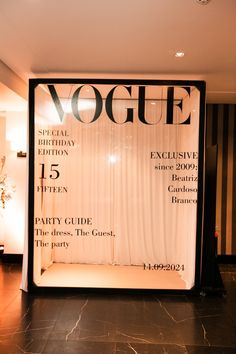 the front cover of a magazine called voggie, featuring an image of a stage curtain