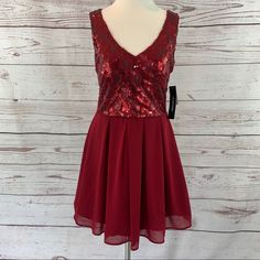 My Michelle Sequin Dress, New With Tags. Nwt Retail $76. Sequin Bust, Fully Lined With Underskirt That Has A Tulle Hem. Skirt Has A Sheer Overlay, Padded Bust, Stretchy Material. Size 13. Flat Measurements Armpit To Armpit 18” Waistband 15.5” Shoulder To Hem 34-35” Keywords Holiday, Christmas, New Years, Party, Formal, Homecoming, Red, Scarlett Red Sleeveless Holiday Dress, Red Sleeveless Holiday Dress For Spring, Red Mini Dress For Festive Spring Occasion, Red Holiday Dress For Spring Party, Fitted Burgundy Dress For Holiday, Fitted Burgundy Holiday Dress, Red Fit And Flare Mini Dress For Night Out, Sleeveless Burgundy Holiday Dress, Red Fit And Flare Dress For Night Out