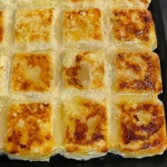 a pan filled with food sitting on top of a stove