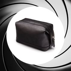 Always well groomed, we think Bond would love our elegant Black Full Grain Compact Leather Wash Bag. This zipped wash case is the perfect size for your travel essentials. Lined with waterproof fabric, the inside offers a large single compartment with zip pocket to put your essentials. Durable piped edges make this product a faithful travel companion. #SageBrown #London #Cambridge #JamesBond #007 #Sleek #Dapper #Stylish #Mens #Luxury #Leather #Essentials #Timeless #Elegance #ItsAllInTheDetails Leather Wash Bag, Wash Bag, Waterproof Fabric, Wash Bags