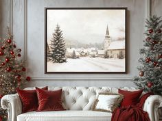 a living room decorated for christmas with white couches and red throw pillows on the floor