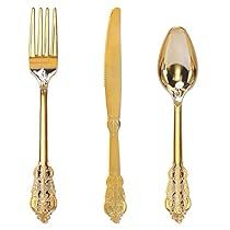 gold colored utensils and spoons on a white background