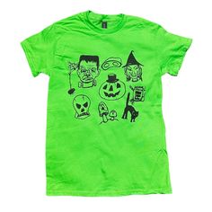 Halloween lime green t-shirt designed by yours truly. I love everything about the colors and art from the Halloweens of the past. I drew, then painted this design by hand. Heavily inspired by old blow molds, costumes, fun-size candy bars, and even some new ideas like my morel ghosties. I hope you like it!  Cotton Screen printed unisex boxy fit Green Themed T-shirt With Short Sleeve, Green Themed Short Sleeve T-shirt, Themed Green Short Sleeve T-shirt, Pre-shrunk Green Pop Culture T-shirt, Green Pre-shrunk Pop Culture T-shirt, Green Themed Crew Neck Top, Themed Green Crew Neck Top, Green Pop Culture Tops With Character Print, Green Glow In The Dark Crew Neck T-shirt