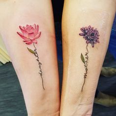 two matching tattoos with flowers on their arms, one is pink and the other is purple