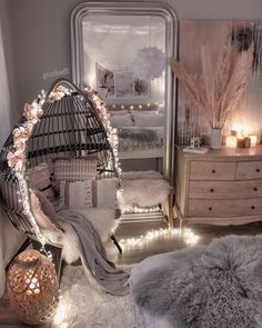 a bedroom decorated with lights and fur rugs