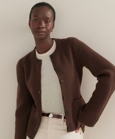 Cooper Cardigan Chocolate Featuring a structured silhouette that nips in at the waist and a very slight bell sleeve that instantly elevates any ensemble, this iconic cardigan effortlessly holds its own in any wardrobe. The fitted body enables versatile styling: wear it open like a blazer with a t-shirt underneath or buttoned up as a pullover. Jenni Kayne Cooper Cardigan, Brown Single Breasted Cardigan For Work, Classic Fall Fitted Sweater Coat, Brown Single-breasted Cardigan For Work, Classic Fitted Sweater Coat For Fall, Elegant Brown Sweater Coat For Layering, Fitted Cashmere Outerwear With Button Cuffs, Classic Single Breasted Cardigan For Workwear, Classic Single-breasted Cardigan For Work