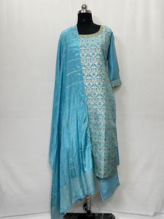 Blue Zari / Brocade Straight Sleeveless Silk Kurta With Trousers and Dupatta Indian Summer Wear Salwar Kameez / Indian Ethnic Dress / Plus Size Cotton Kurta Dress Traditional Indian Wear / Salwar Kameez Dupatta / Kurti Palazzo Set The set contains: 1 Kurta 1 Palazzos 1 Dupatta Kurta: The Blue straight Kurta has a round neck design with brocade / Zari woven design. The Kurta measures till calf length and has straight hemline. it comes with two pockets.  Sleeve length :  3/4 Sleeves Palazzos: Solid trousers  has elasticated waistband and slip on closure.  Dupatta : Printed Dupatta.  Material : Kurta : Silk Blend Palazzos :  Silk Blend Dupatta : Silk Blend Fabric Care : Hand wash Please see the size information below to choose a perfect size for yourself:  (size in inches)  XS : BUST 34 | WAI Blue Semi-stitched Traditional Wear For Formal Occasions, Traditional Blue Palazzo Set For Diwali, Blue Jamawar Salwar Kameez For Wedding, Blue Palazzo Set With Dupatta For Summer, Summer Blue Palazzo Set With Dupatta, Traditional Blue Palazzo Set For Festive Season, Traditional Blue Palazzo Set For Festive Occasions, Blue Jamawar Sharara For Wedding, Traditional Light Blue Festive Palazzo Set