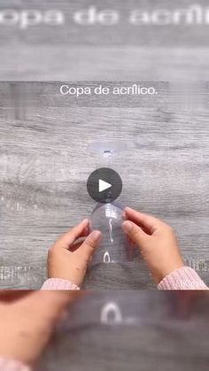 two hands are pressing buttons on a wooden board with the words coppa de acrificio