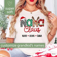 a woman wearing a santa clause shirt with her name on it