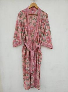 A robe and kimono is a perfect addition to your holiday wardrobe. A perfect loungewear kimono robes are comfortable for hot humid summer days. The block printing on the fabric is rich and vibrant. Colours may vary due to screen setting and lightening. Specification: Length : 47 inch Bust : Fit upto 50 inch Pockets : Yes With belt. For any other information please drop me a message. Womens Bathrobes, Nightwear Dress, Cotton Dressing Gown, Kimono Dressing Gown, Kimono Floral, Clothing Haul, Printed Robe, Floral Robes, Dragon Print