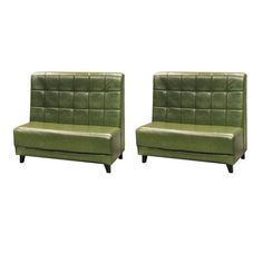 a pair of green leather chairs sitting next to each other