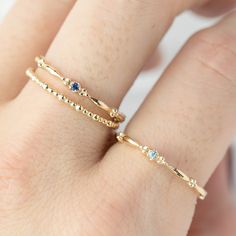 This dainty birthstone stackable ring is unlike any other, the band has a unique design all around which gives a bit of antique feel. Perfect gift for July birthdays! * Stock size: US 7 * Genuine 1.5mm blue sapphire * Band width: ≈1.75mm * Setting size: ≈2mm * Material: 14k solid yellow gold (rose gold or white gold option available) * Made of 100% recycled precious metal and ethically sourced gemstone * Comes in a gift box with a bow ready for gifting * Handmade with love and great care in New Mothers Ring Stackable, Stackable Birthstone Rings, Citrine Birthstone, Birthstone Ring Mothers, Sapphire Solitaire Ring, Topaz Birthstone, September Birthstone Rings, Family Rings, Tenderloin Recipes