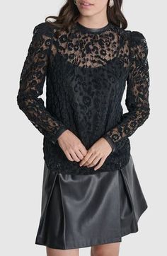 This long-sleeve top of airy mesh lace brings a hint of edgy glamour to any look. Back keyhole with button-and-loop closure Jewel neck Long sleeves Camisole lining 63% polyester, 37% nylon Hand wash, dry flat Imported Chic Lace Top For Fall Layering, Fall Lace Mesh Top, Elegant Mesh Top With Lace Sleeves, Long Sleeve Mesh Top For Fall Party, Long Sleeve Lace Top For Night Out, Fall Party Long Sleeve Mesh Top, Sheer Long Sleeve Tops For Night Out, Long Sleeve Lace Blouse For Night Out, Long Sleeve Blouse With Lace Sleeves For Night Out