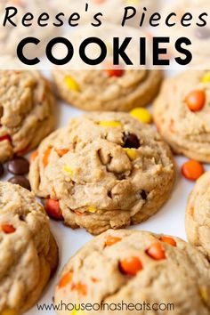 reese's pieces cookies on a white platter with candy corn and chocolate chips