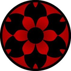 a red and black flower in a circular pattern on a white background is the center point of this image