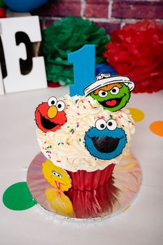 a birthday cupcake with the number one on it