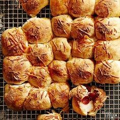 several pastries sitting on top of a cooling rack