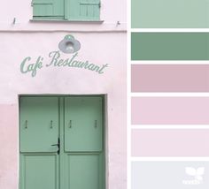 a pink building with green shutters and the words cafe restaurant painted on it