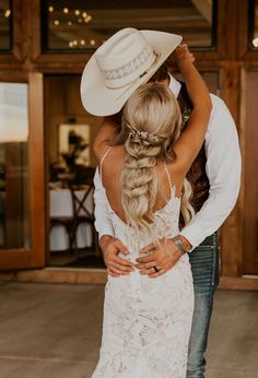 a bride and groom sharing a first dance together