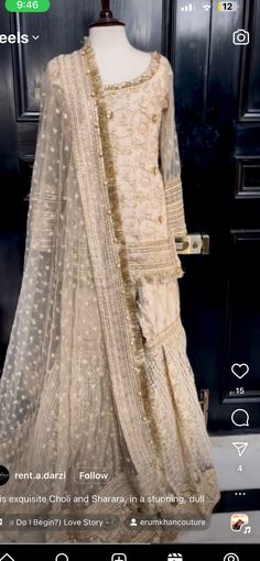 a dress on display in front of a door