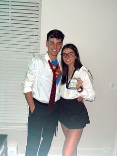 a man and woman dressed up for halloween