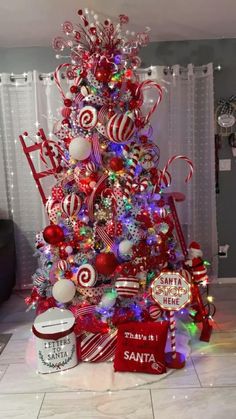 a christmas tree decorated with candy canes and candies